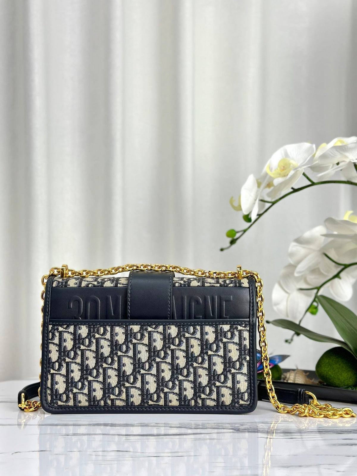 MONTAIGNE 25 BAG IN BLUE OBLIQUE JACQUARD