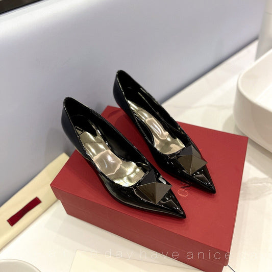 One Stud Black Patent Black Leather Pump