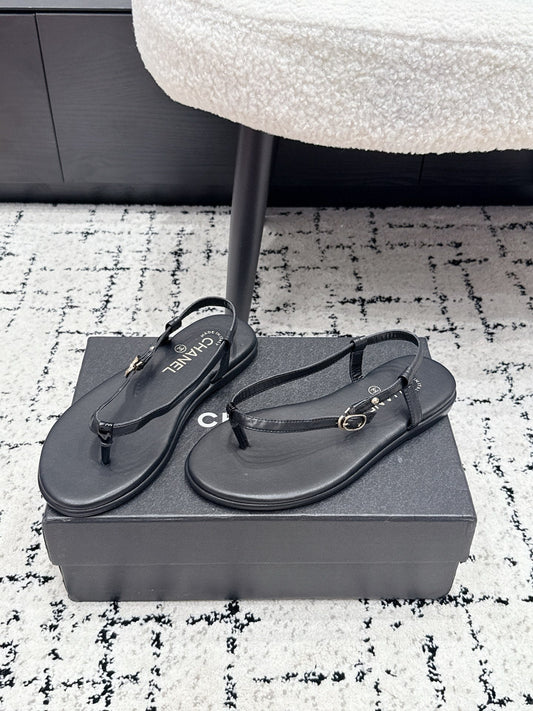 Chanel 26S Thong Sandals In Black Calfskin With Gold Hardware