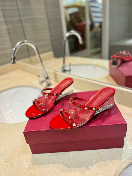 ROCKSTUD MULE SANDALS IN CHERRY RED CALFSKIN AND TRANSPARENT PVC FILM