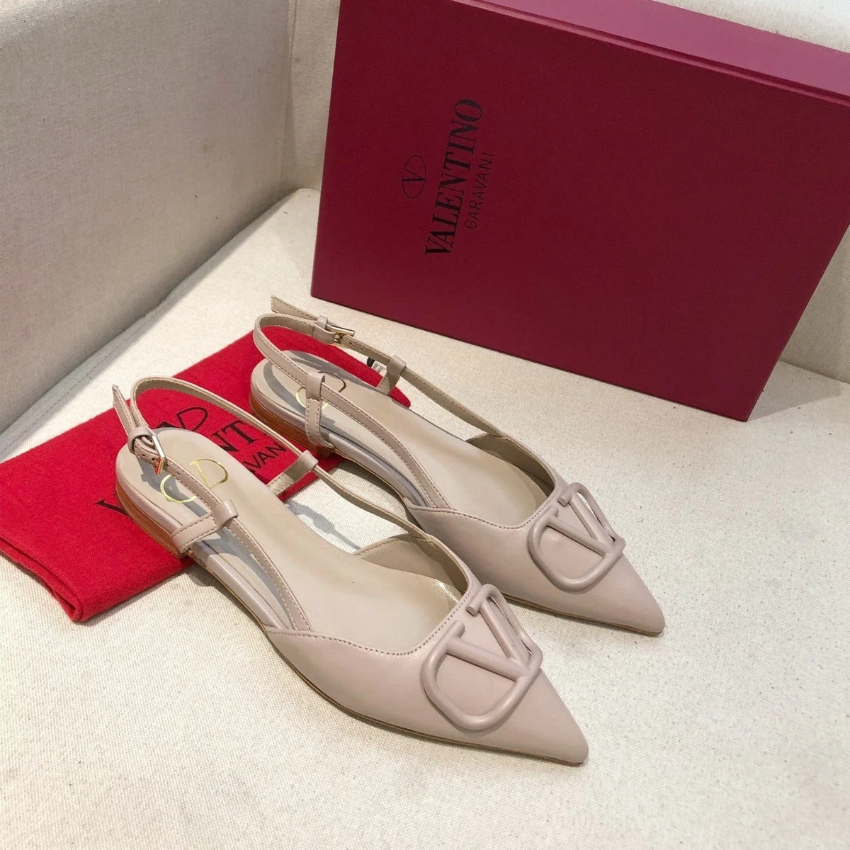 VLOGO SIGNATURE LIGHT PINK CALFSKIN FLAT SLINGBACK PUMP