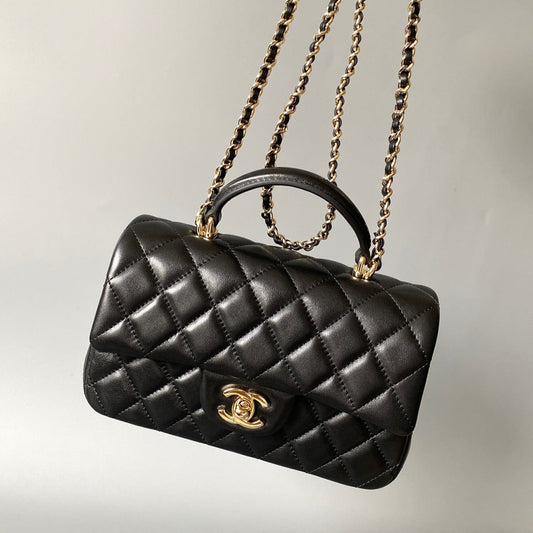 mini flap bag top handle 20cm black lambskin gold hardware