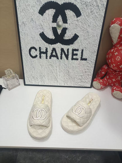 Chanel 26s Quilted Slide Sandals In White Calfskin