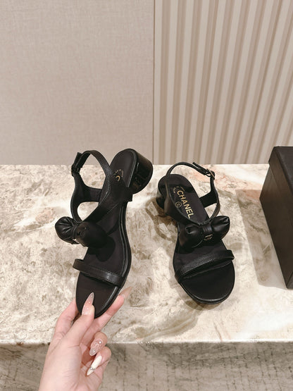 CC 26s Bow Sandals Black Cowhide 658471