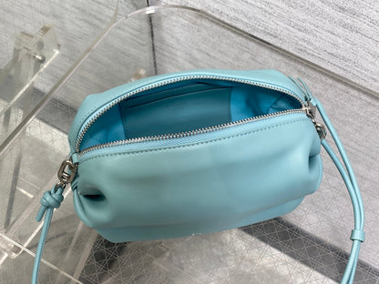 CD Bow Pouch Light Blue Lambskin 286629