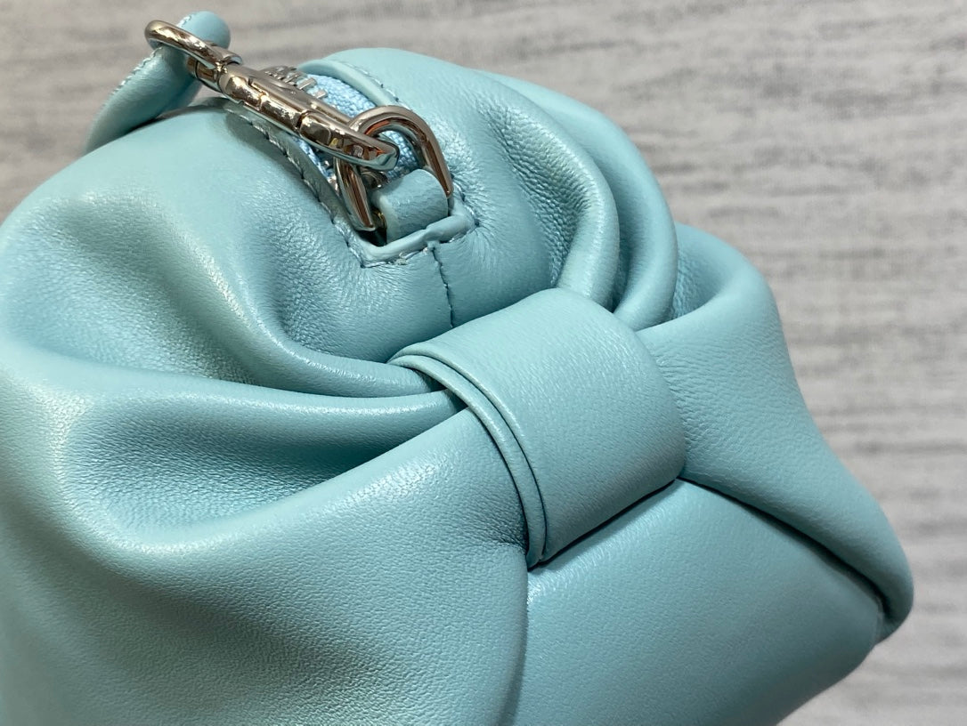 CD Bow Pouch Light Blue Lambskin 286629