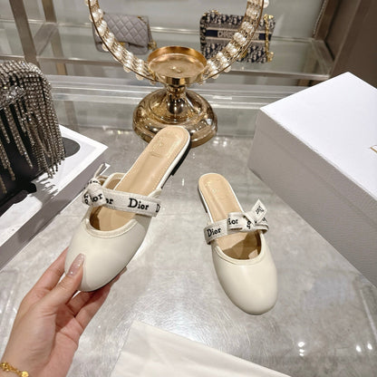 CD 26 Bow Flat Mules Embroidered Sheepskin